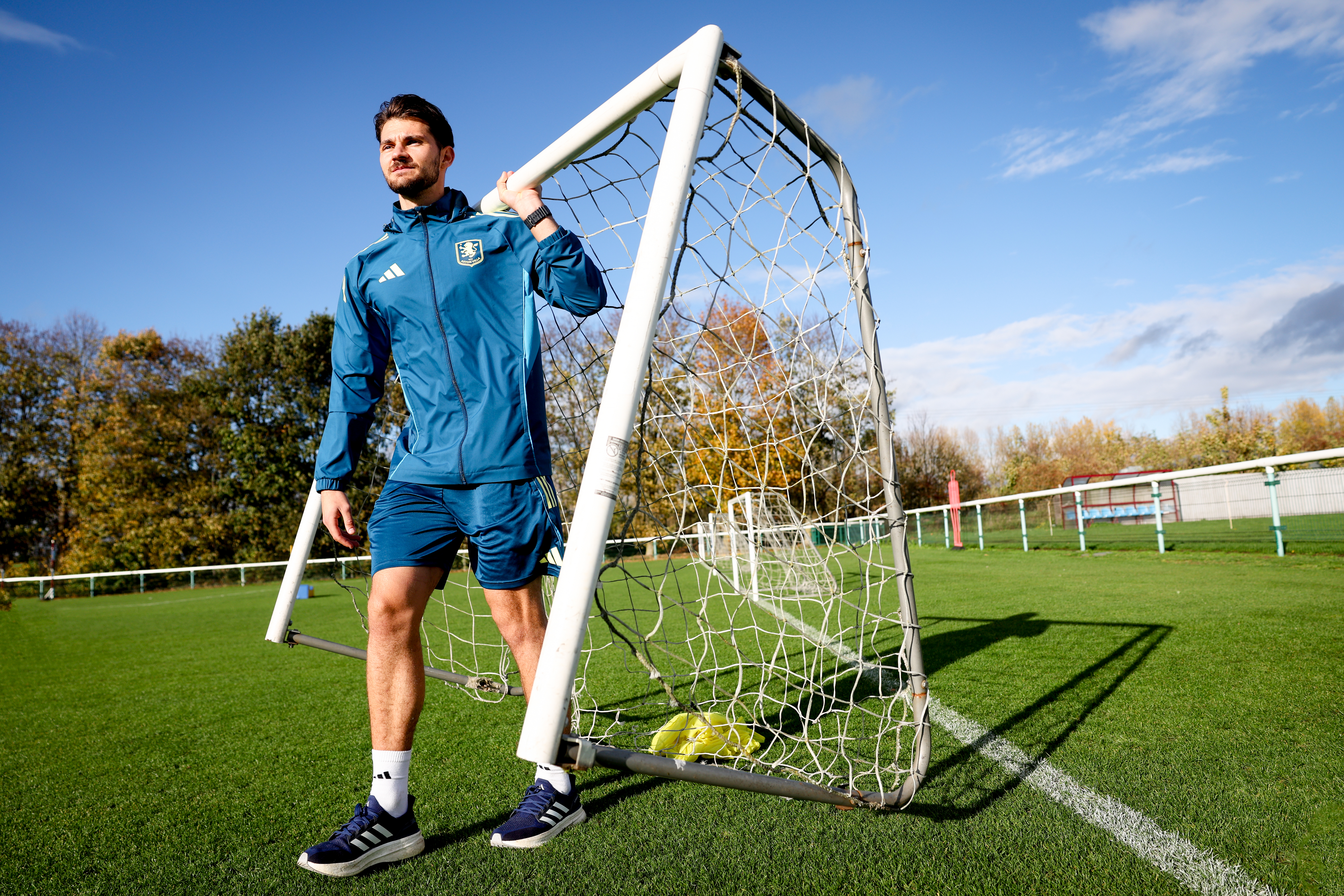 two men standing on a field