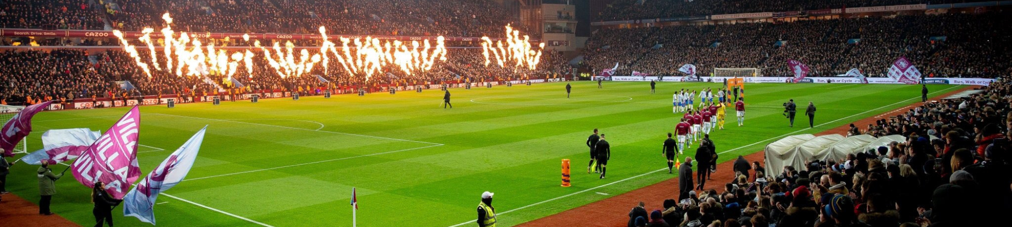 Team Walking Out on Pitch with Fireworks and Flags 
